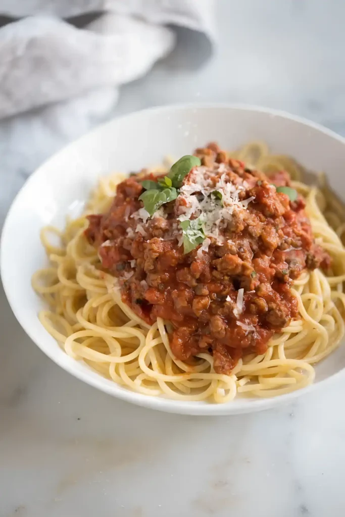 best spaghetti sauce recipe served over pasta with parmesan