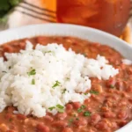 red beans and rice recipe with creamy beans and fluffy white rice served in a bowl