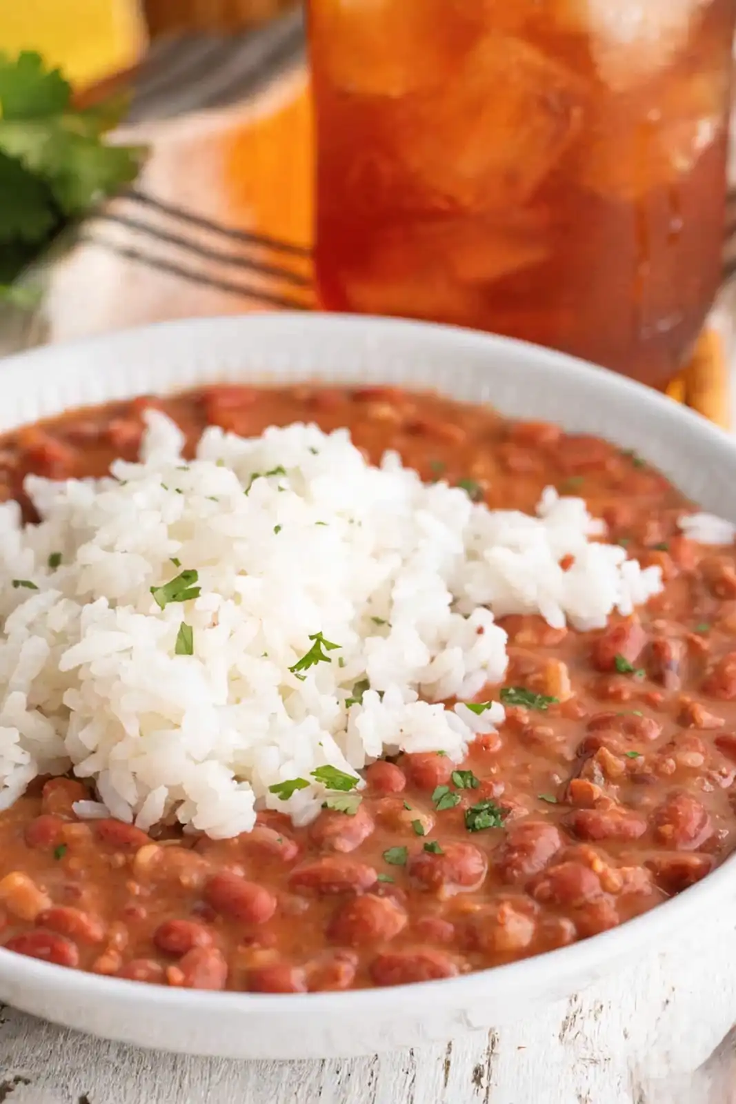 red beans and rice recipe with creamy beans and fluffy white rice served in a bowl