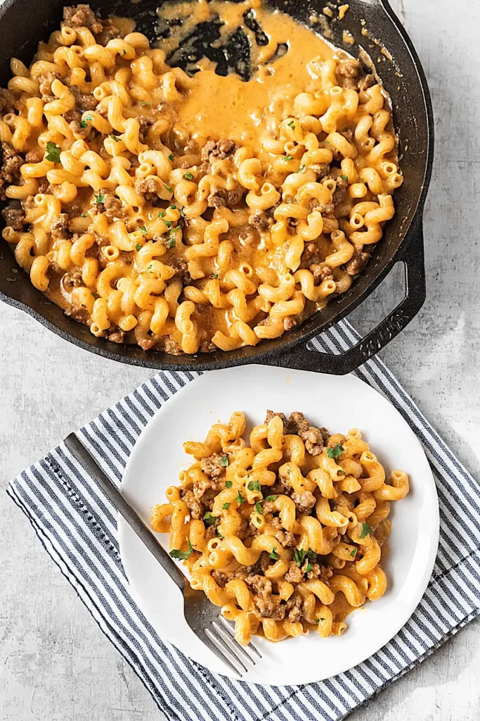 Cheesy hamburger helper recipe served on plate with ground beef macaroni and creamy cheddar sauce