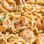 Creamy garlic shrimp pasta with linguine, juicy shrimp, and parsley in a rich sauce