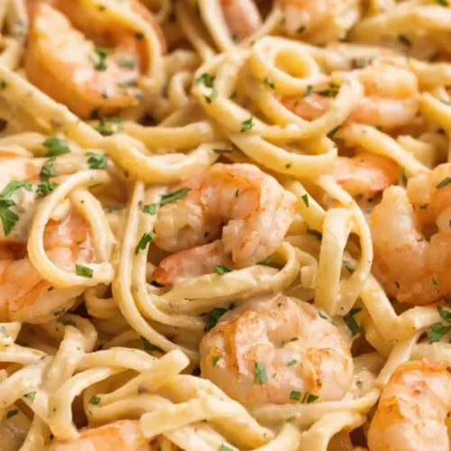 Creamy garlic shrimp pasta with linguine, juicy shrimp, and parsley in a rich sauce